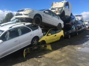 Damaged vehicle loaded for transport